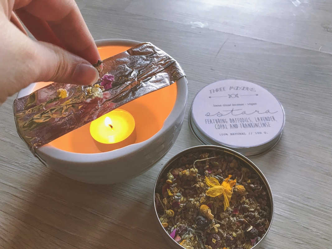 Sprinkling some of my Ostara incense on the foil Sprinkling some of my Ostara incense on the foil.