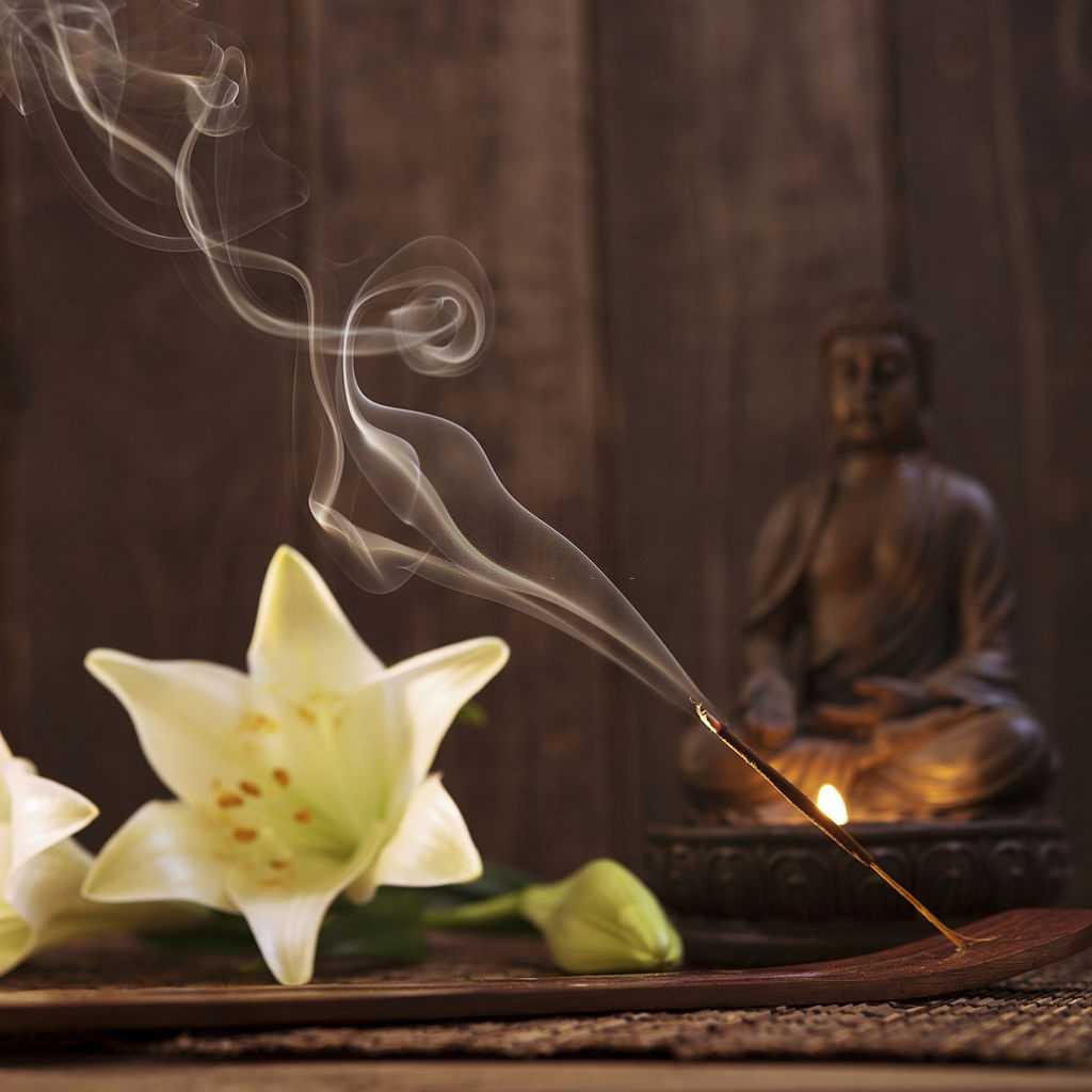 A burning vanilla incense stick A burning vanilla incense stick.