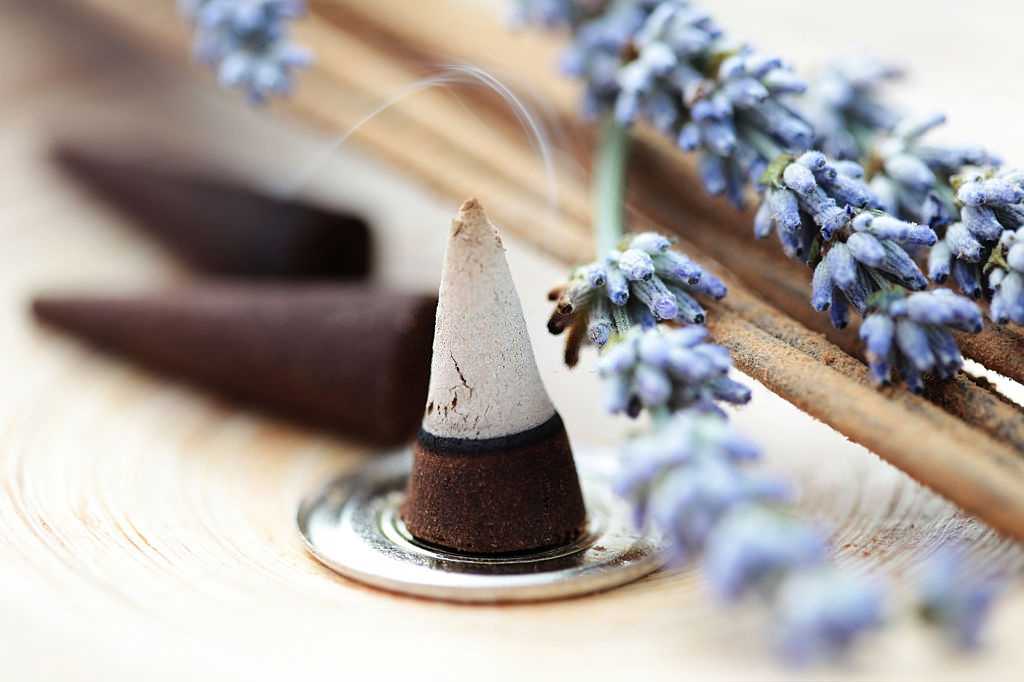 Incense cones beside lavender Incense cones beside lavender