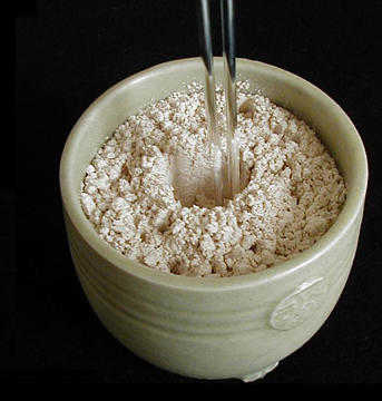 Preparing Hole for Charcoal Preparing Hole for Charcoal