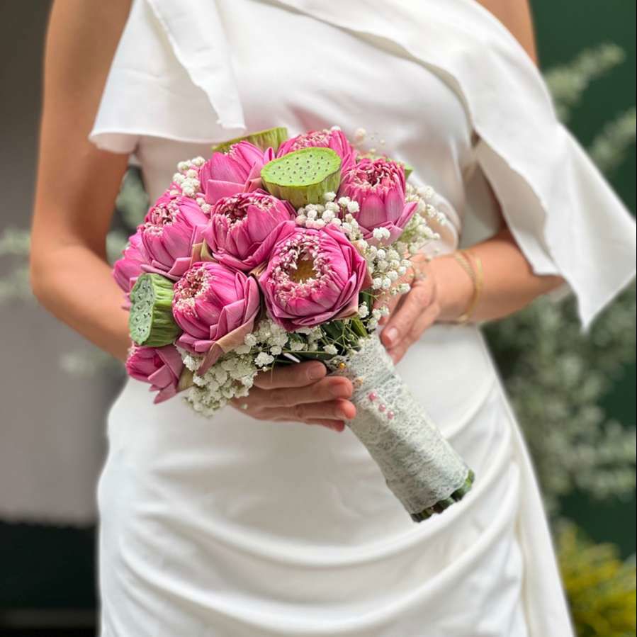 The lotus flower makes the perfect accompaniment for a bride on her special day